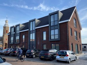 verbouw bestaand pand naar 8 appartementen en uitbreiding huisartsenpraktijk te ‘s-Gravenpolder